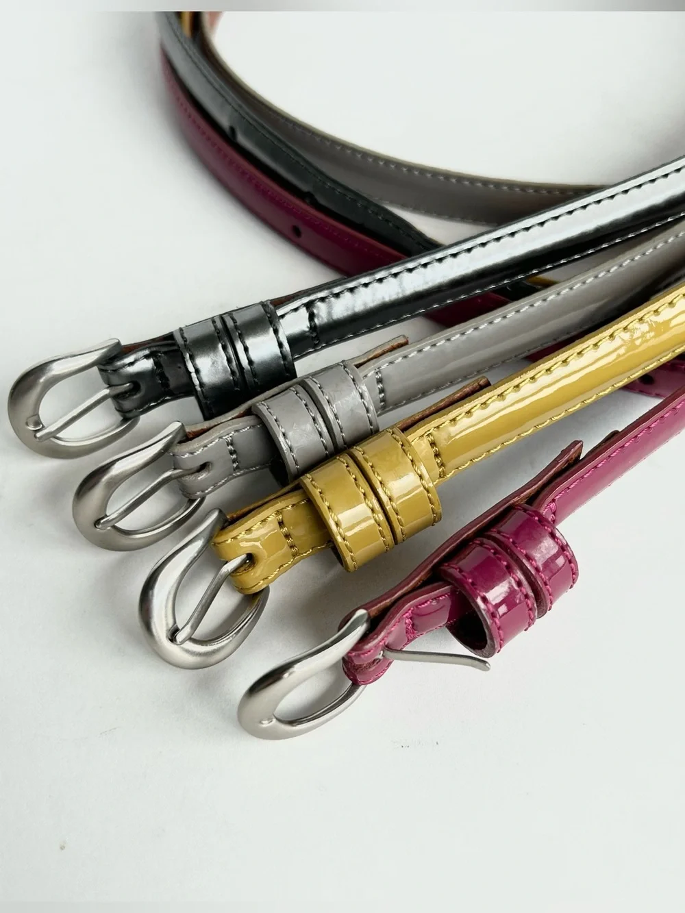 4 X Uniqlo lacquered leather skinny belt